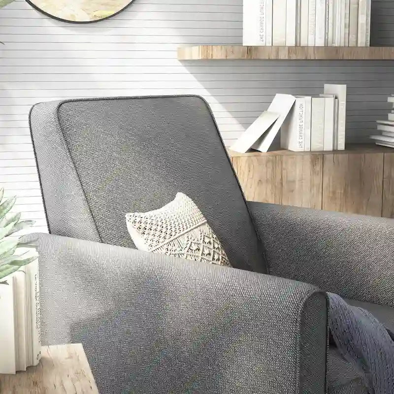 Fauteuil inclinable matelassé en tissu avec passepoil