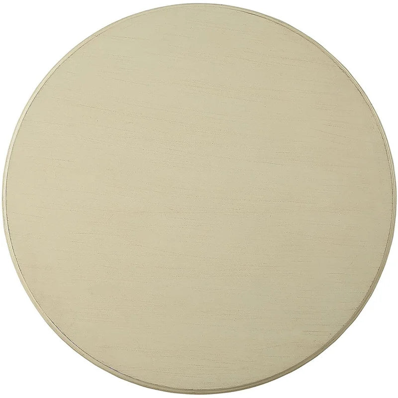 Table piédestal ronde en bois blanc vieilli