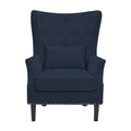 Fauteuil à oreilles en velours côtelé et clous tapissiers classiques