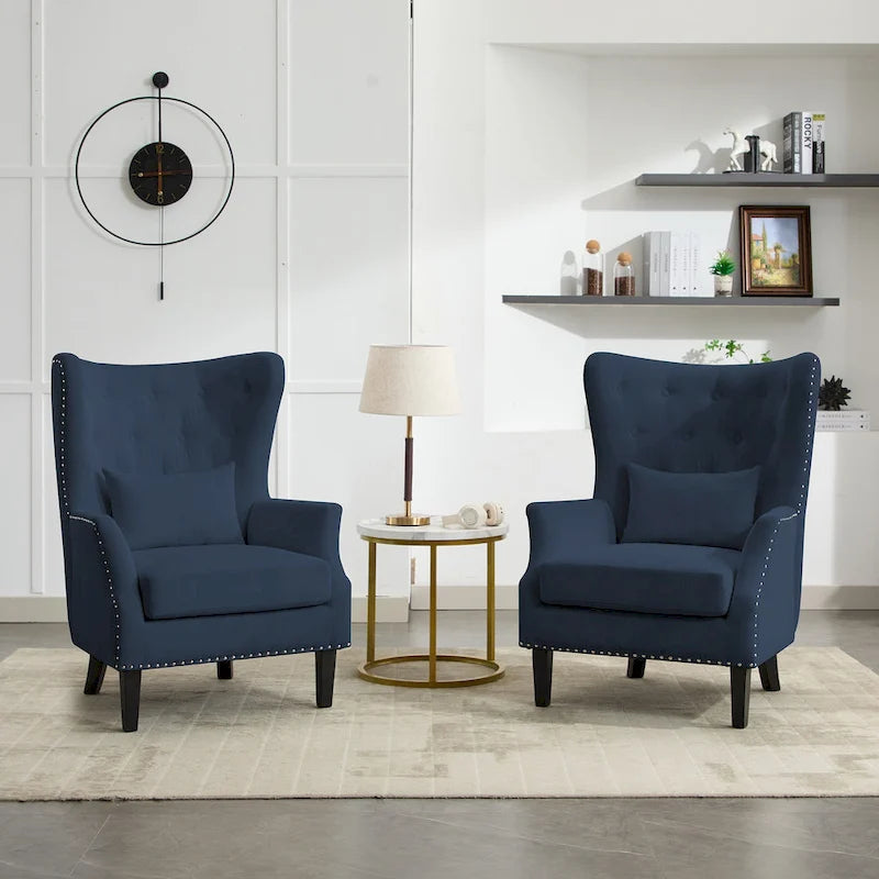 Fauteuil à oreilles en velours côtelé et clous tapissiers classiques