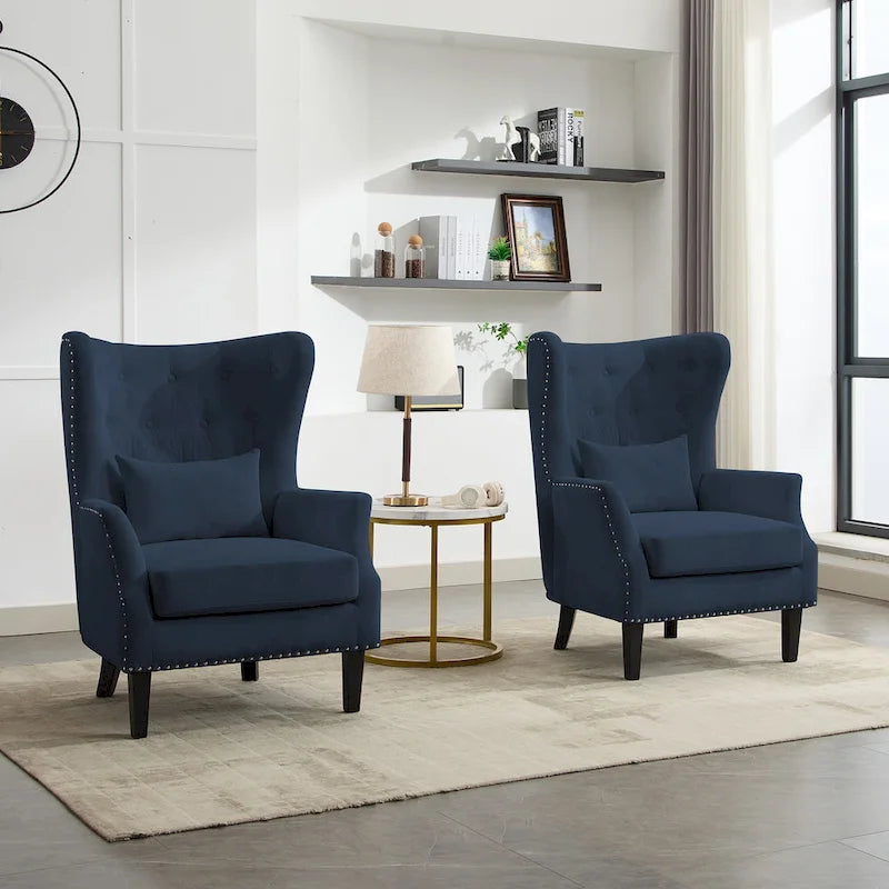 Fauteuil à oreilles en velours côtelé et clous tapissiers classiques
