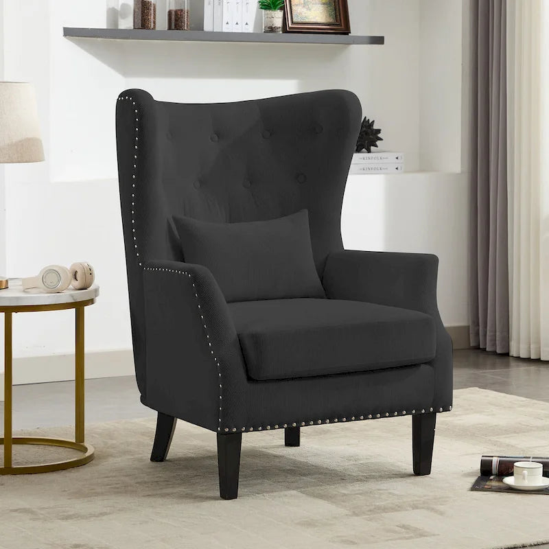 Fauteuil à oreilles en velours côtelé et clous tapissiers classiques