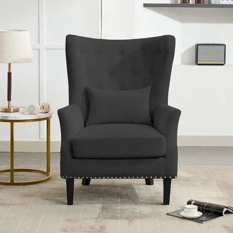 Fauteuil à oreilles en velours côtelé et clous tapissiers classiques