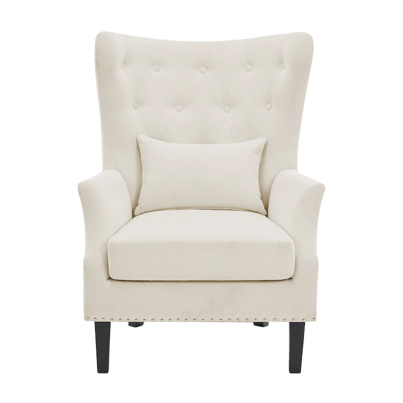 Fauteuil à oreilles en velours côtelé et clous tapissiers classiques